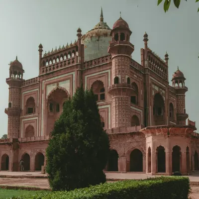 Safdarjung Tomb:A lesser-known but stunning Mughal tomb with lush gardens. The symmetrical design and the peaceful atmosphere make it a perfect place for photography.