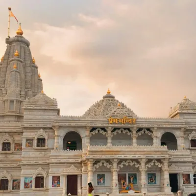 Prem Mandir: A beautiful marble temple set amidst lush gardens, creating a serene atmosphere for photos
