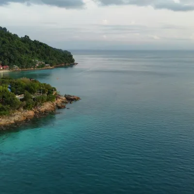 Perhentian Islands: Ideal for crystal-clear waters, snorkeling, scuba diving, and laid-back beach vibes.